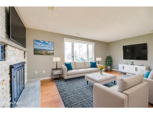 Lower U-62 Third Line, Oakville, ON - Indoor Photo Showing Living Room With Fireplace