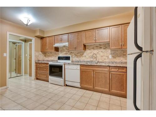 104-99 Donn Avenue, Stoney Creek, ON - Indoor Photo Showing Kitchen With Double Sink