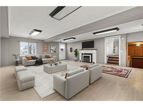 429 St. John'S Road E, Simcoe, ON - Indoor Photo Showing Living Room With Fireplace