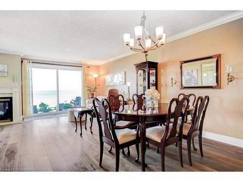 27-515 North Service Road, Stoney Creek, ON - Indoor Photo Showing Dining Room With Fireplace