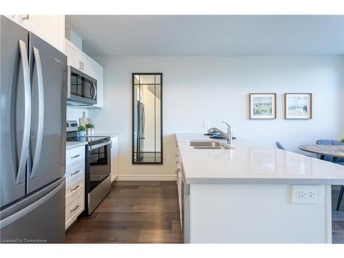 210-2620 Binbrook Road E, Binbrook, ON - Indoor Photo Showing Kitchen With Double Sink With Upgraded Kitchen