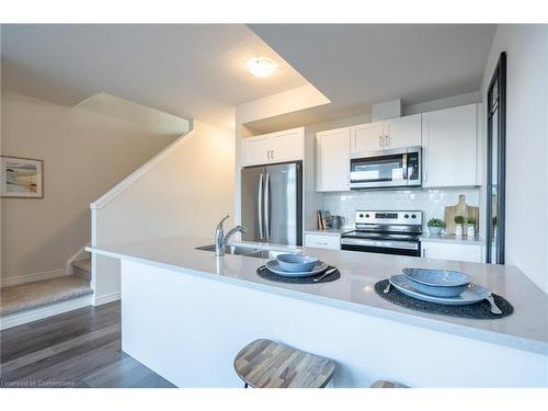 210-2620 Binbrook Road E, Binbrook, ON - Indoor Photo Showing Kitchen With Double Sink