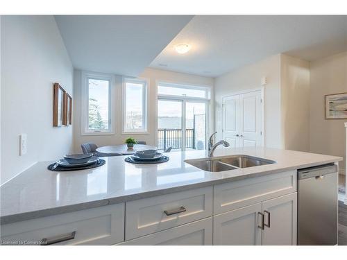 210-2620 Binbrook Road E, Binbrook, ON - Indoor Photo Showing Kitchen With Double Sink