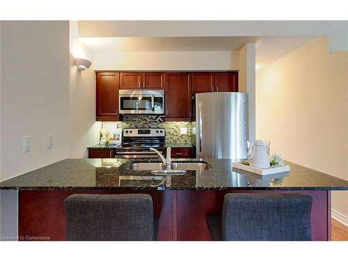 302-8 Brandy Lane Drive, Collingwood, ON - Indoor Photo Showing Kitchen With Double Sink