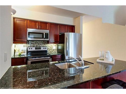 302-8 Brandy Lane Drive, Collingwood, ON - Indoor Photo Showing Kitchen With Double Sink