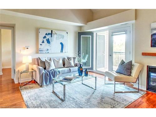 302-8 Brandy Lane Drive, Collingwood, ON - Indoor Photo Showing Living Room With Fireplace