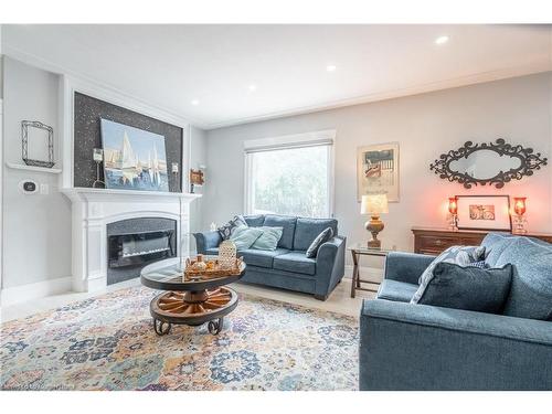 181 East 5Th Street, Hamilton, ON - Indoor Photo Showing Living Room With Fireplace