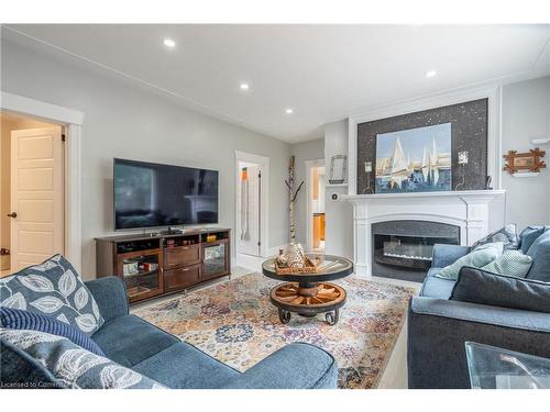 181 East 5Th Street, Hamilton, ON - Indoor Photo Showing Living Room With Fireplace