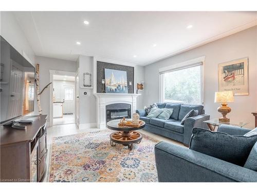 181 East 5Th Street, Hamilton, ON - Indoor Photo Showing Living Room With Fireplace