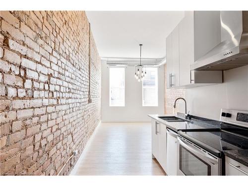 1-187 King Street E, Hamilton, ON - Indoor Photo Showing Kitchen With Double Sink