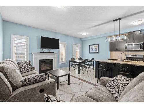 55 Sonoma Valley Crescent, Hamilton, ON - Indoor Photo Showing Living Room With Fireplace