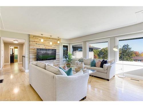 10 Reservoir Road, Stoney Creek, ON - Indoor Photo Showing Living Room With Fireplace