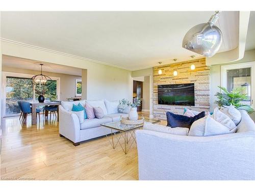 10 Reservoir Road, Stoney Creek, ON - Indoor Photo Showing Living Room With Fireplace