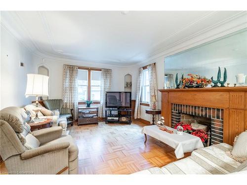 19 Pottruff Road S, Hamilton, ON - Indoor Photo Showing Living Room With Fireplace