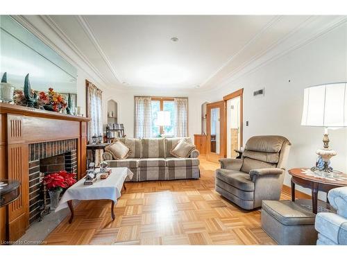 19 Pottruff Road S, Hamilton, ON - Indoor Photo Showing Living Room With Fireplace