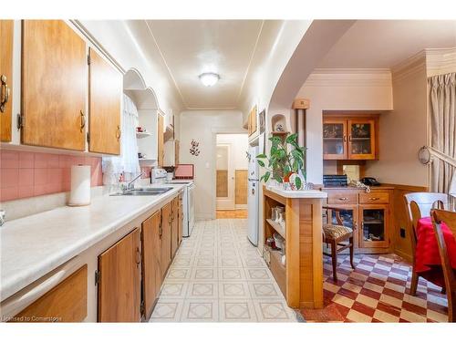 19 Pottruff Road S, Hamilton, ON - Indoor Photo Showing Kitchen With Double Sink