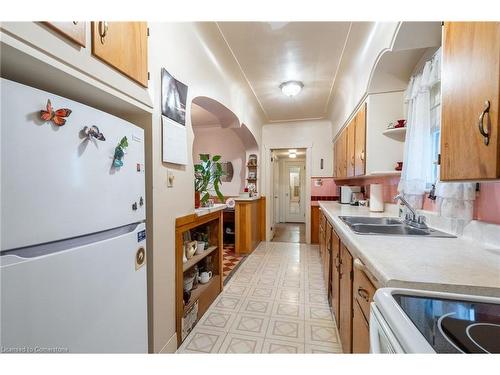 19 Pottruff Road S, Hamilton, ON - Indoor Photo Showing Kitchen With Double Sink