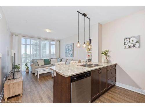 705-16 Concord Place, Grimsby, ON - Indoor Photo Showing Kitchen With Double Sink