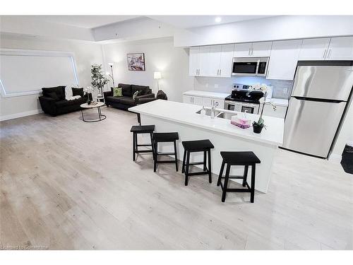 308-4514 Ontario Street, Beamsville, ON - Indoor Photo Showing Kitchen With Double Sink