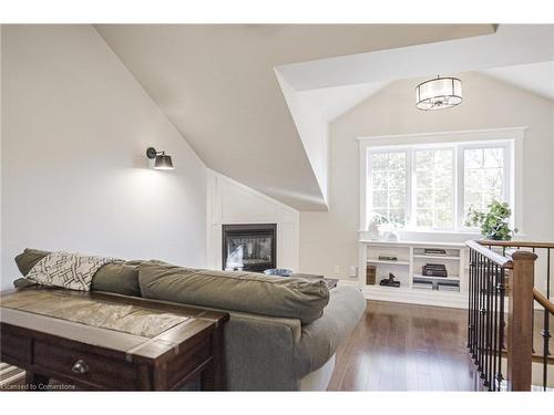 1016 North Shore Boulevard E, Burlington, ON - Indoor Photo Showing Other Room With Fireplace