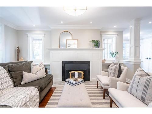 1016 North Shore Boulevard E, Burlington, ON - Indoor Photo Showing Living Room With Fireplace