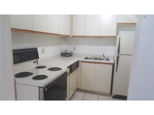 406-1 Jacksway Crescent, London, ON - Indoor Photo Showing Kitchen With Double Sink