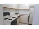 406-1 Jacksway Crescent, London, ON  - Indoor Photo Showing Kitchen With Double Sink 