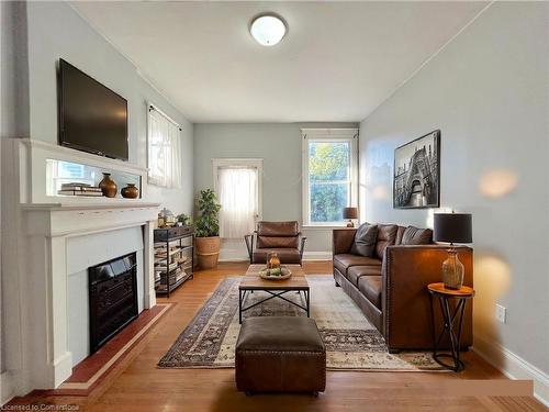 D-49 Victoria Avenue S, Hamilton, ON - Indoor Photo Showing Living Room With Fireplace