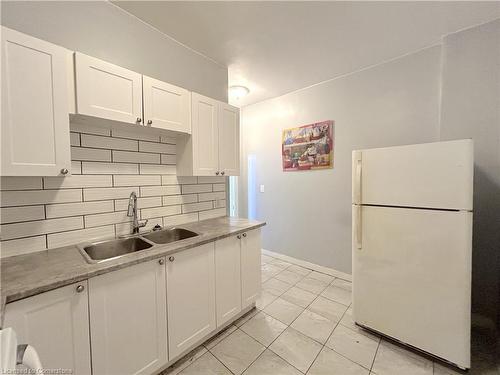 D-49 Victoria Avenue S, Hamilton, ON - Indoor Photo Showing Kitchen With Double Sink