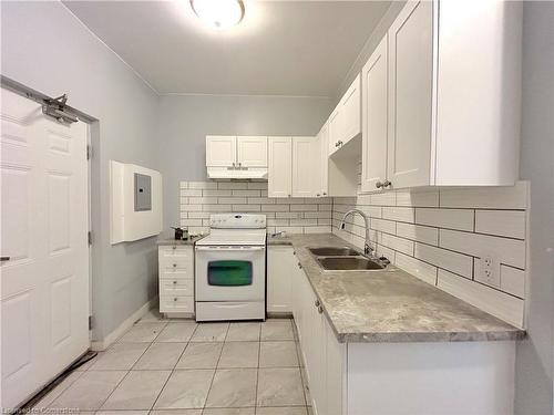 D-49 Victoria Avenue S, Hamilton, ON - Indoor Photo Showing Kitchen With Double Sink