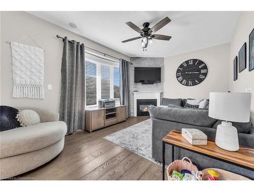 8 Saybrook Gardens, Stoney Creek, ON - Indoor Photo Showing Living Room With Fireplace