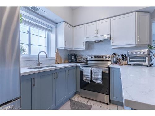 104-415 Grange Road, Guelph, ON - Indoor Photo Showing Kitchen With Stainless Steel Kitchen With Double Sink