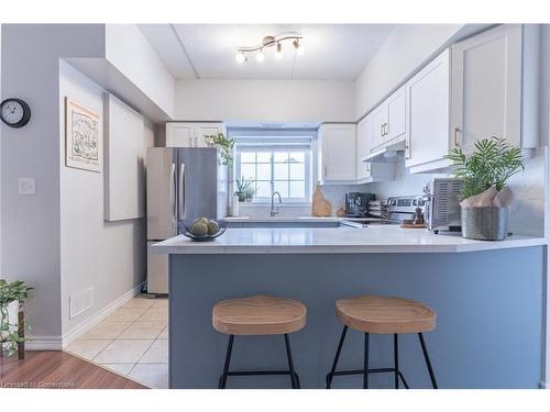 104-415 Grange Road, Guelph, ON - Indoor Photo Showing Kitchen