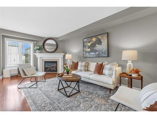 17-242 Upper Mount Albion Road, Stoney Creek, ON - Indoor Photo Showing Living Room With Fireplace