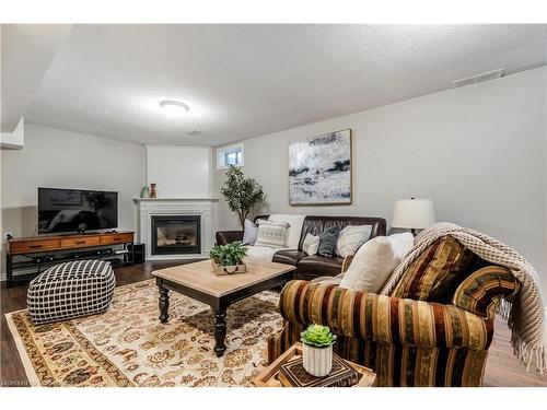 2 Aquasanta Crescent, Hamilton, ON - Indoor Photo Showing Living Room With Fireplace