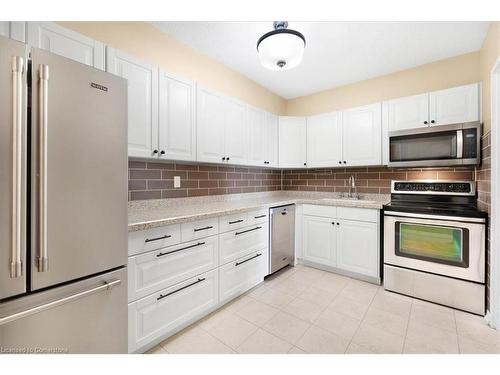 1604-1359 White Oaks Boulevard, Oakville, ON - Indoor Photo Showing Kitchen With Stainless Steel Kitchen