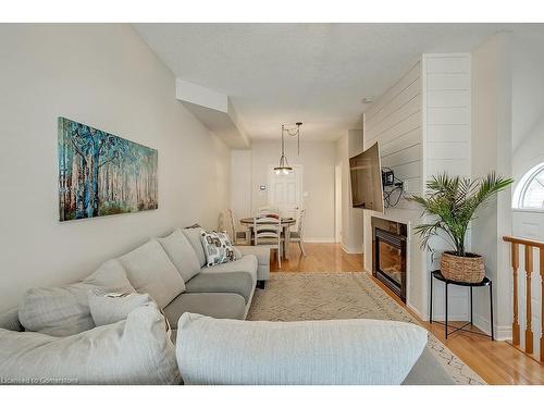 59-1169 Dorval Drive, Oakville, ON - Indoor Photo Showing Living Room With Fireplace