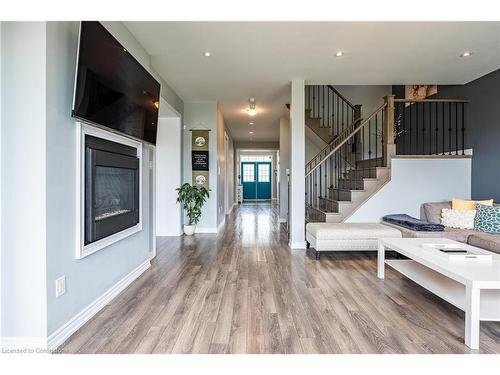 8445 Sweet Chestnut Drive, Niagara Falls, ON - Indoor Photo Showing Living Room With Fireplace