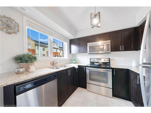 14-2480 Post Road, Oakville, ON - Indoor Photo Showing Kitchen With Stainless Steel Kitchen With Double Sink