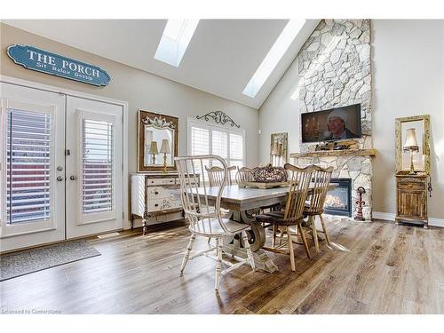 4 Valiant Circle, Binbrook, ON - Indoor Photo Showing Dining Room With Fireplace