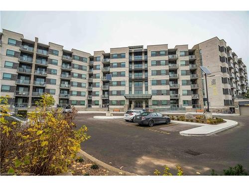 411-383 Main Street E, Milton, ON - Outdoor With Balcony With Facade