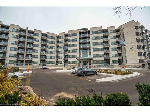 411-383 Main Street E, Milton, ON - Outdoor With Balcony With Facade