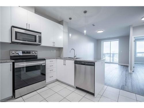 411-383 Main Street E, Milton, ON - Indoor Photo Showing Kitchen With Stainless Steel Kitchen