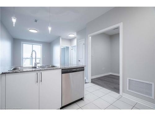 411-383 Main Street E, Milton, ON - Indoor Photo Showing Kitchen