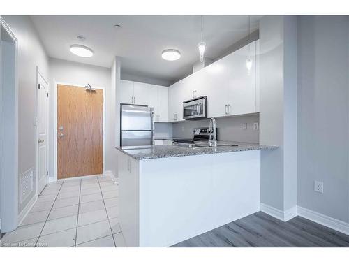 411-383 Main Street E, Milton, ON - Indoor Photo Showing Kitchen