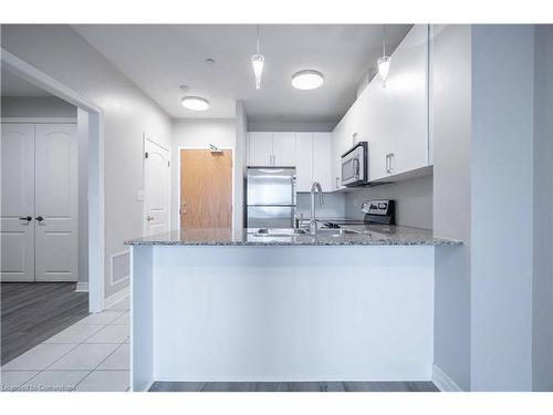 411-383 Main Street E, Milton, ON - Indoor Photo Showing Kitchen