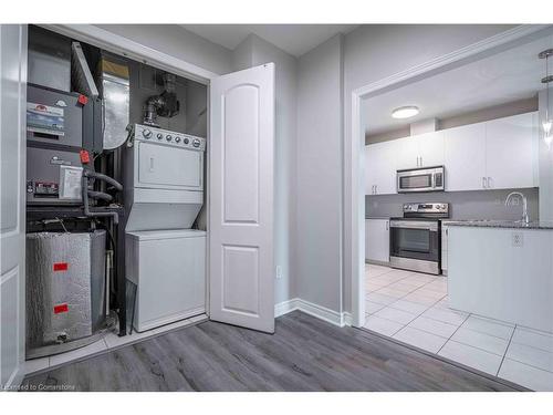 411-383 Main Street E, Milton, ON - Indoor Photo Showing Laundry Room