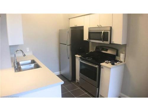 612-112 King Street E, Hamilton, ON - Indoor Photo Showing Kitchen With Stainless Steel Kitchen With Double Sink