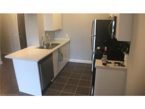 612-112 King Street E, Hamilton, ON - Indoor Photo Showing Kitchen With Double Sink