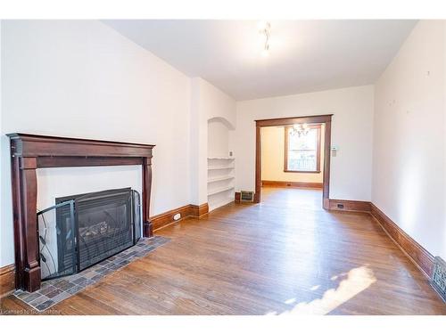 26 Ontario Avenue, Hamilton, ON - Indoor Photo Showing Living Room With Fireplace